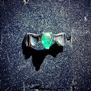 Fragrant jewels black ring with green stone from cabin in the woods collection.